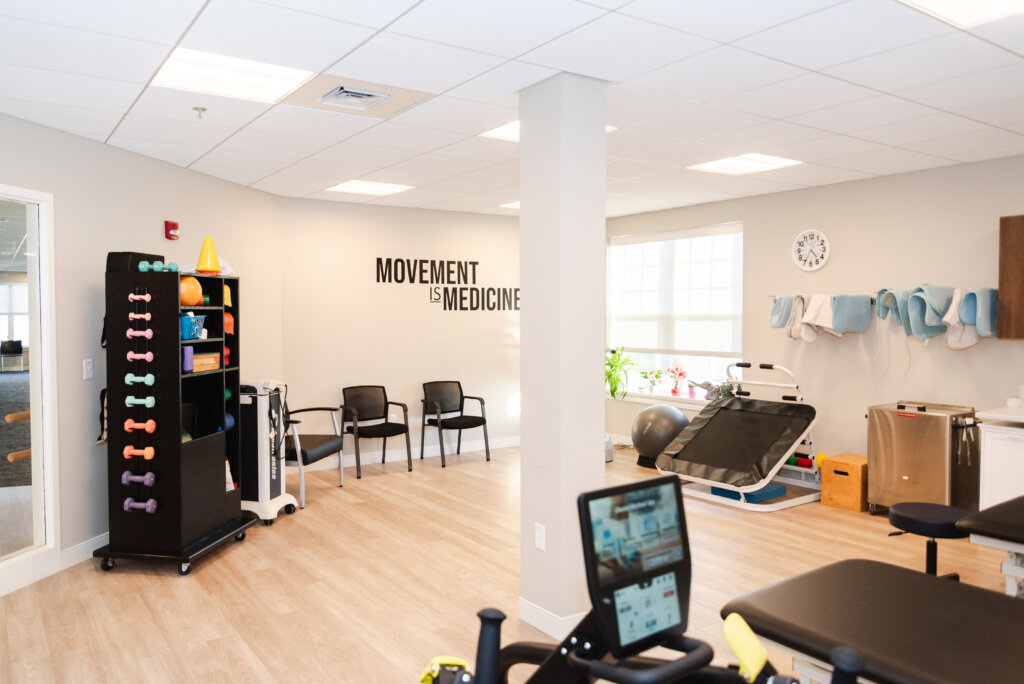 Outpatient Physical Therapy center at the Good Shepherd Village at Endwell; a wall reads "Movement Is Medicine"